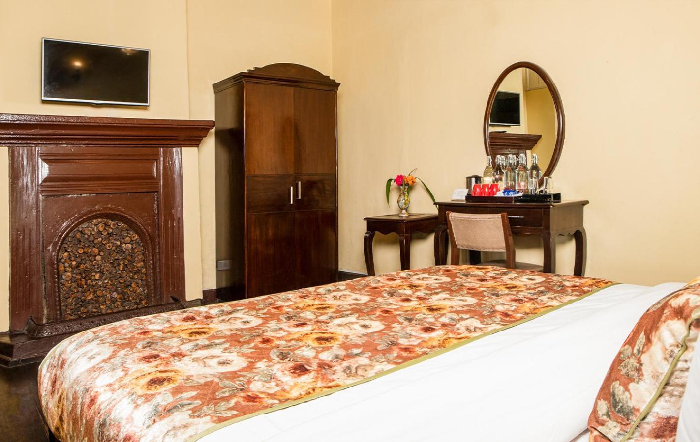 Summit Swiss Heritage Resort & Spa Darjeeling  Rom bilde